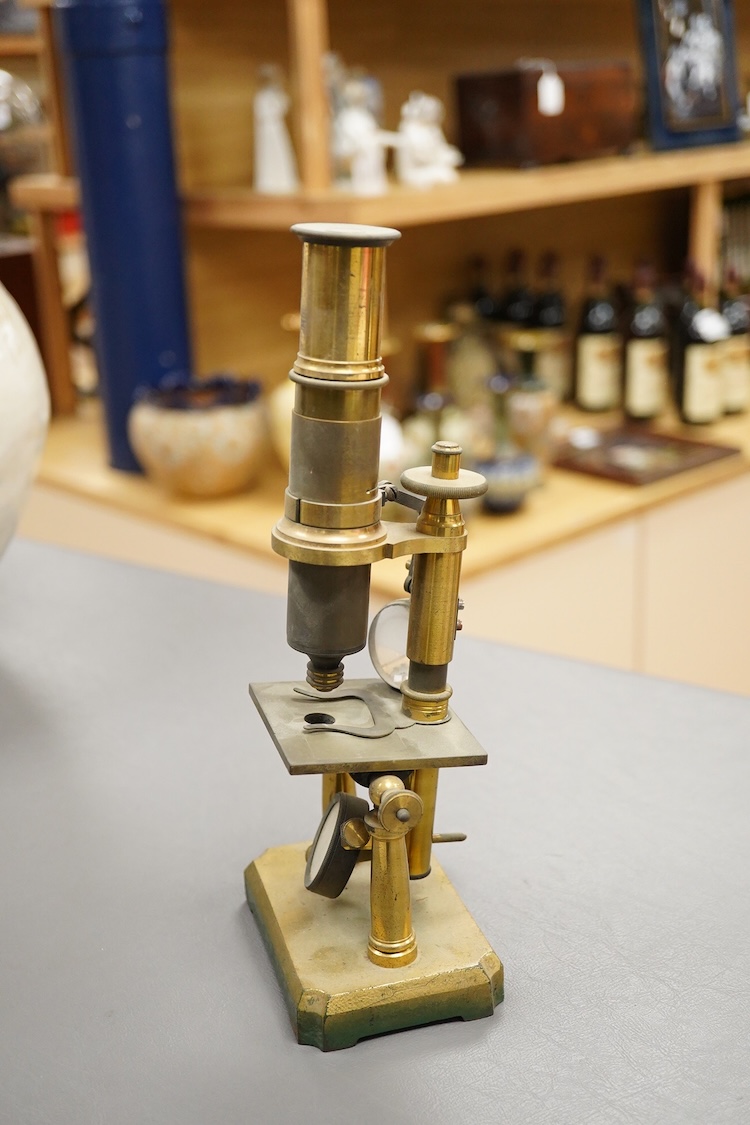 A mid 19th century French brass monocular microscope, 26cm high